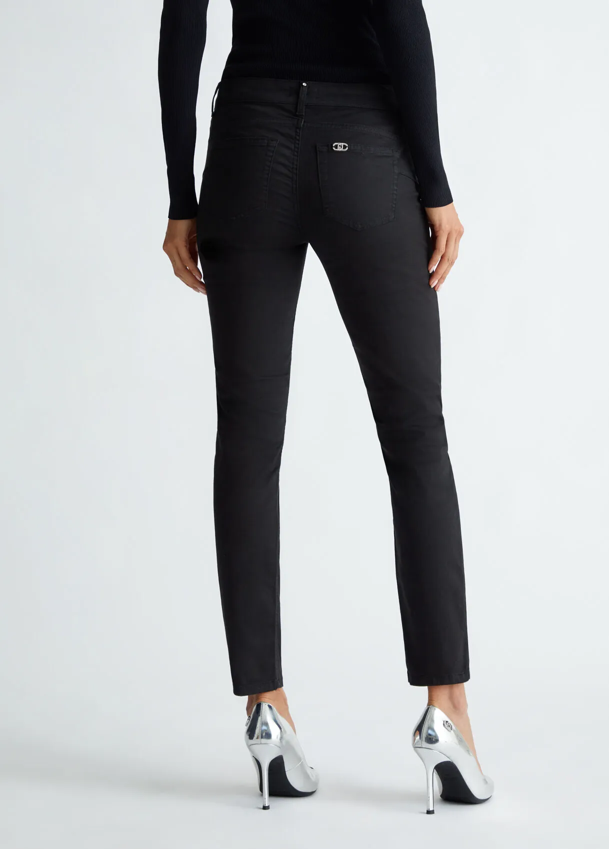Pantaloni bottom up con strass