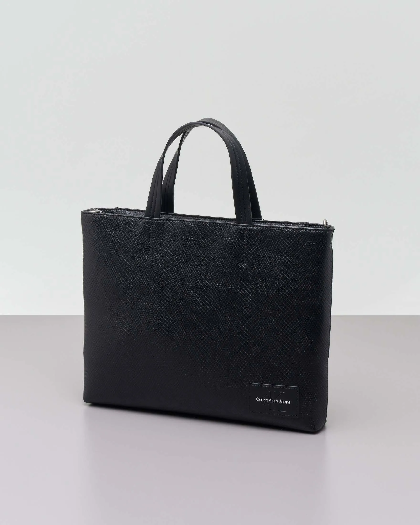Shopping bag nera in similpelle effetto pitonato con doppia tracolla
